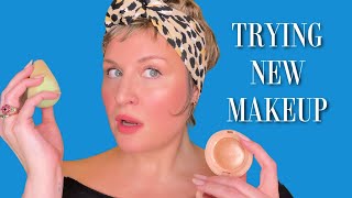 TRYING NEW MAKEUP | RARE BEAUTY HIGHLIGHTERS +| EYE BRIGHTENER | SAIE