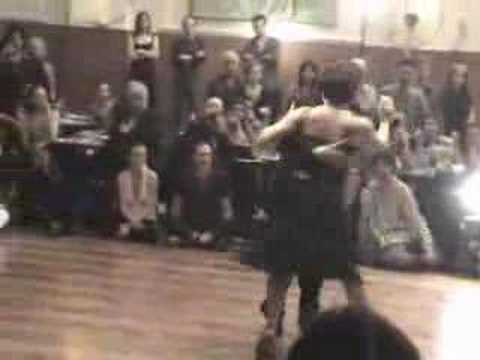  Corina de la Rosa  and  Julio Balmaceda  are  dancing  to  the  tango  "  Y suma y sigue  "