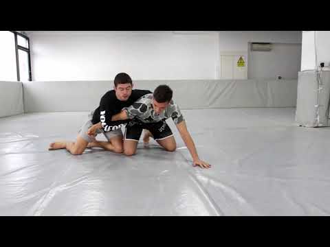 Arm Drag from Bottom Side Control (Dinu Bucalet)