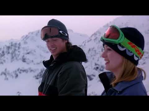 Out Cold 2001 trailer still: snowboarders carving at dawn, setting the soundtrack’s high-energy tone