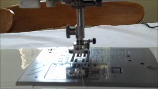 Putting the bobbin in my Janone TXL607 and threading the machine