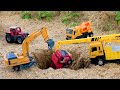 Rescue the truck from the pit with excavator and crane truck