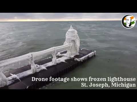 Drone footage shows frozen lighthouse St. Joseph, Michigan