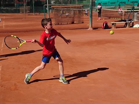 Adrien enjoys some tennis training during his holidays in Barcelona