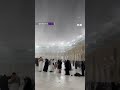 Muslim pilgrims in Mecca experience heavy rainfall at the Kaaba