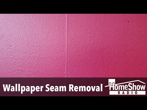 How do I get rid of wall paper seams under my paint?