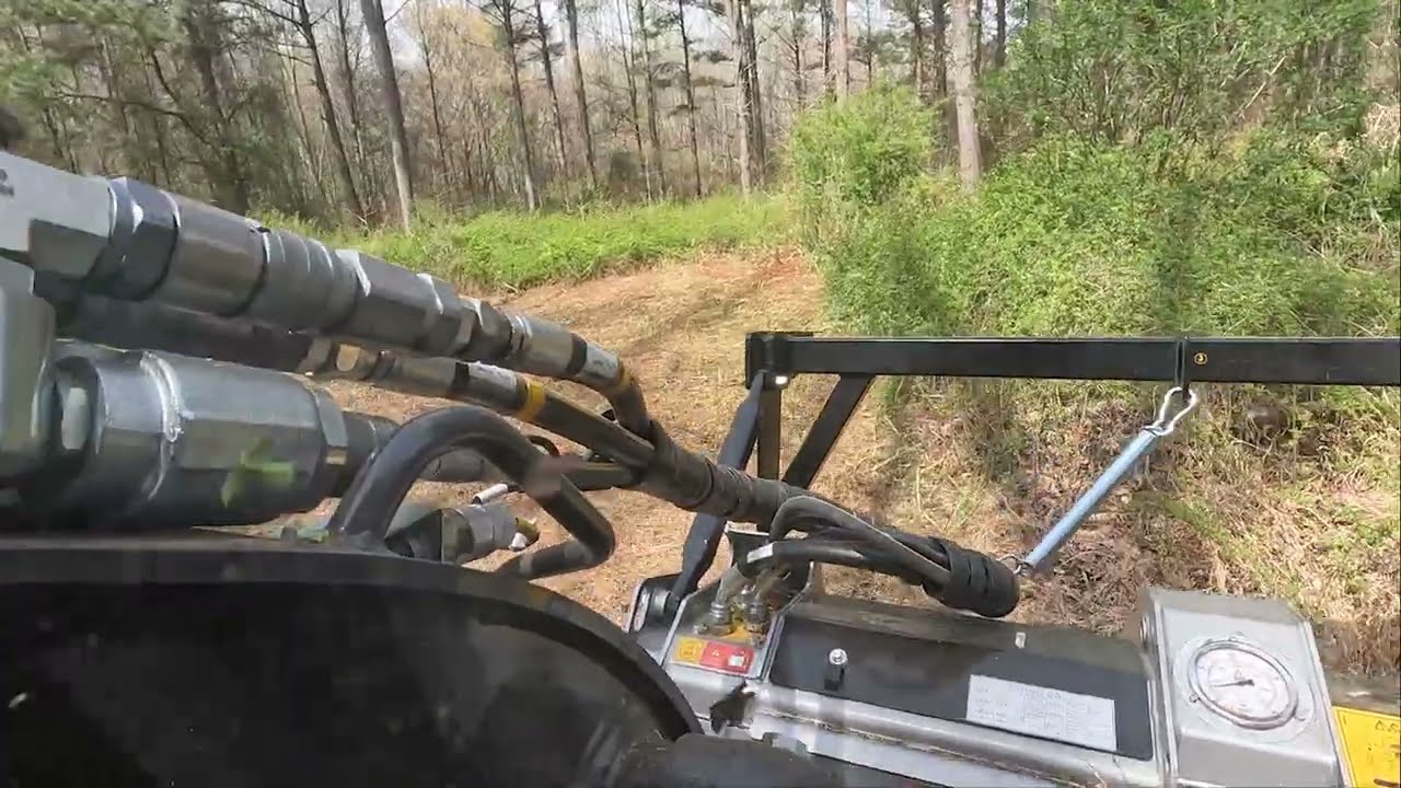 New Holland C332 FAE Mulching a Hunting Property
