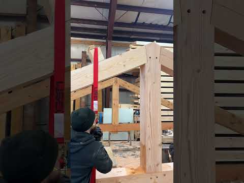 Douglas fir king post truss assembly for a timber frame covered porch. #construction #timberframe