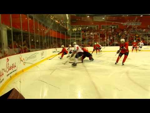 Capitals #42 Danick Paquette checks into boards