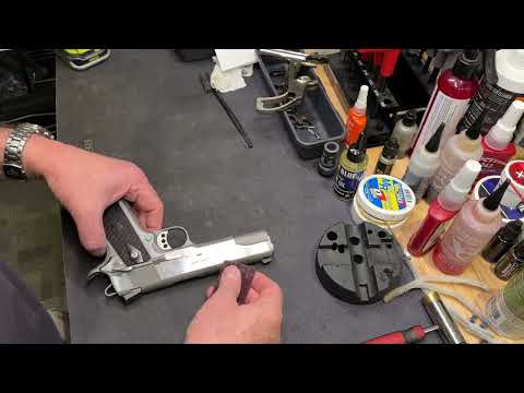 Removing scratches from a brushed stainless slide or surface.