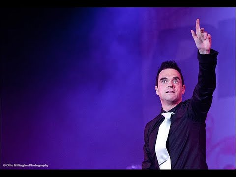 JK As Robbie Williams