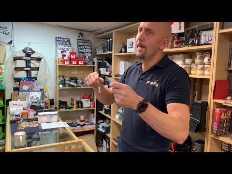 Dave performs Trevor Duffy's amazing Phil Plus trick for some customers