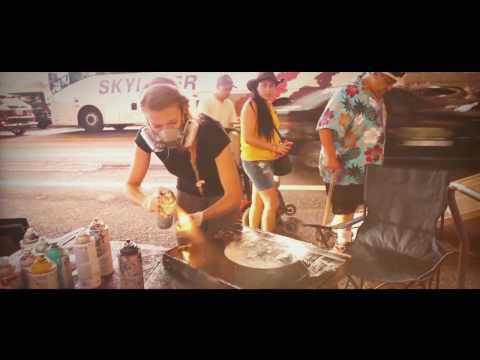 Look what she is doing! (Street art of NYC artist)