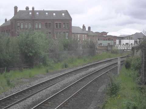 DRS 20305 and 20301 Nuclear Flask Train passing Greensfield