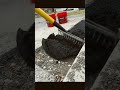Driveway pothole repair with Aquaphalt cold patch