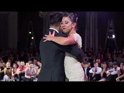  Roxana Suarez  and  Sebastian Achaval  are  dancing  to  the  milonga  "  Saca Chispas  "  by  Julio de Caro  at  TanGO TO Istanbul  in  2019