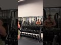 Hairy bodybuilder quick flex in the gym