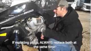 How to change the spark plugs in a snowmobile