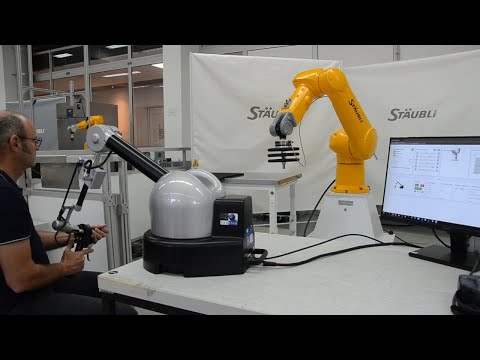 Industrial robot with enthusiasm haptic capability (STAUBLI TX2-160 robot with "Force Sensor")