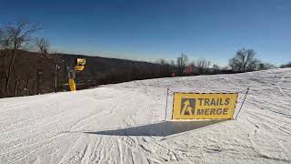 8 year old chasing dad on icy crud (Angel Drop - Blue run) at Whitetail Ski Resort