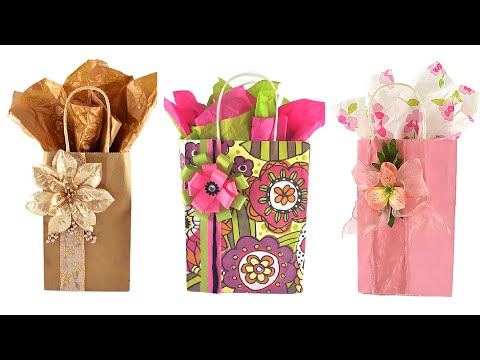 Part of a video titled How To Put Tissue Paper In A Gift Bag (QUICK AND EASY) - YouTube