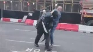 preview picture of video 'A Hero in London City tries to overpower a Robber With Machete .'