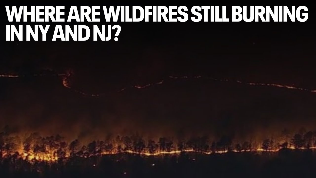Where are wildfires still burning in NJ, NY?