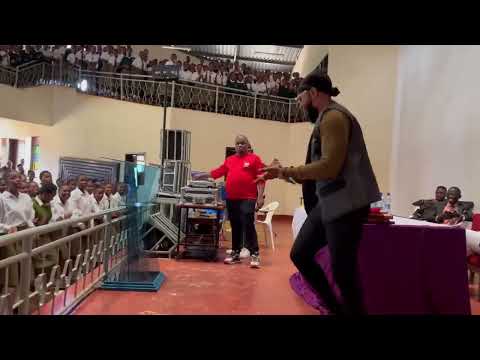 Jose Jay performing AJE at GITWE GIRLS HIGH School