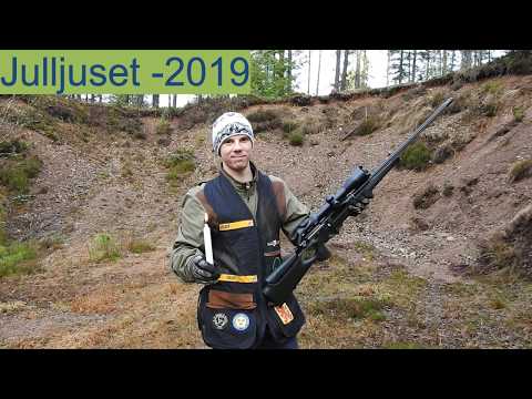 Shooting the flame of a candle with Sauer 404 rifle.