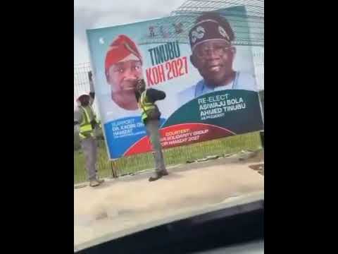 Drama in Lagos as man confronts workers hanging APC campaign banners