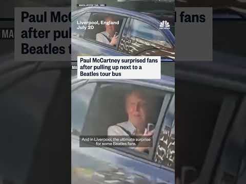 Paul McCartney surprises Beatles fan tour bus
