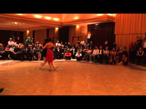  Gisela Natoli  and  Gustavo Rosas  are  dancing  to  a  nontraditional song  by  Astor Piazzolla  at  Aix Tango Festival  in  2012