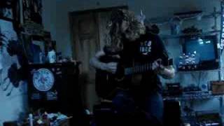 Mike Andreoli playing guitar / Jon Henderson