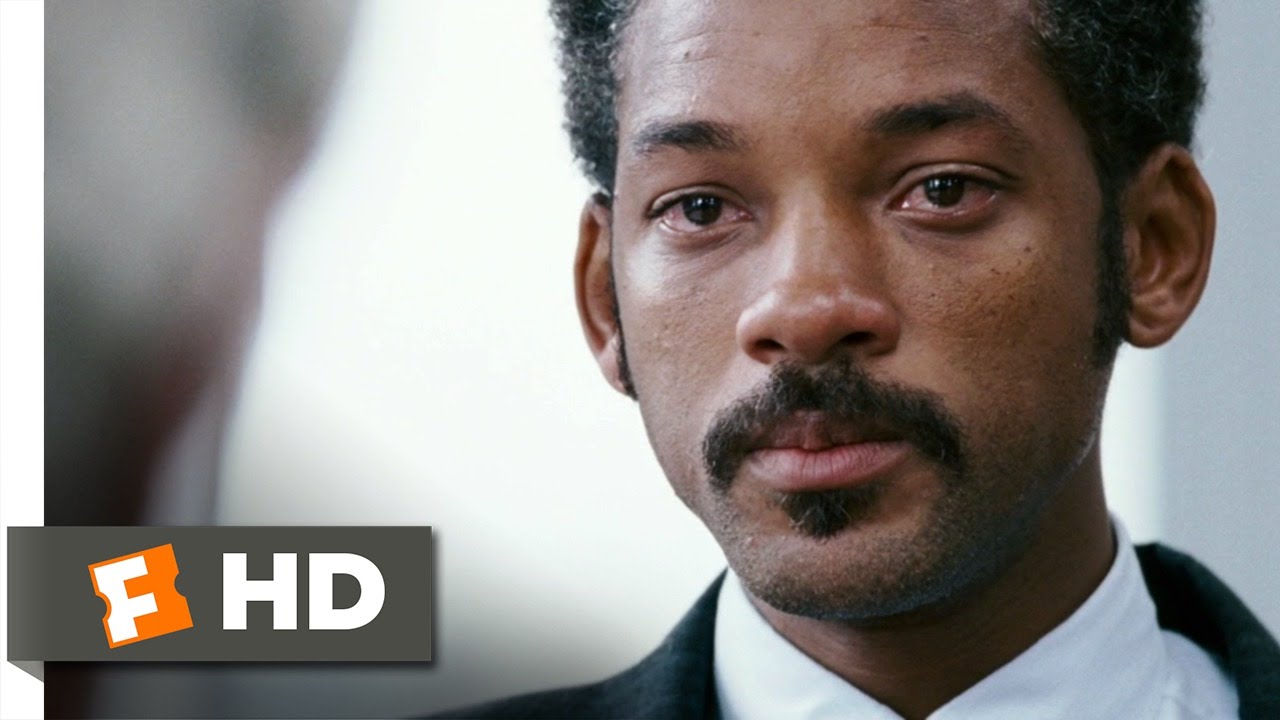 The Pursuit of Happyness — Chris delivers a composed, confident sales pitch during a high-stakes brokerage interview despite wearing work clothes