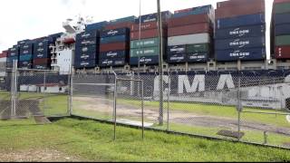 preview picture of video 'CMA CGM White Shark enters the Gatun Locks of the Panama Canal'
