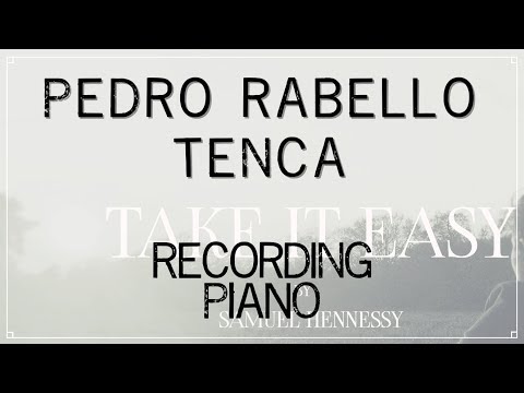 Samuel recording a grand piano using a stereo matched pair of Neumann KM184s in an X Y Placement