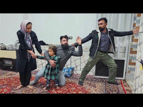 Fatimah cooking dinner and taking care of Afsaneh's children