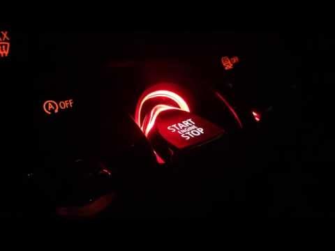 A toggle ignition switch glowing red in 2016 Mini Cooper S 5 door