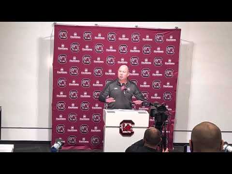 Pete Lembo presents a gift to Steve Fink