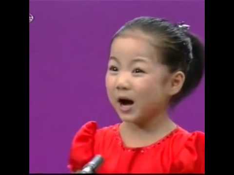 Young Chinese girl singing