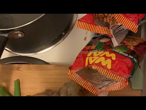 Cooking Asian instant a fried noodles with mixed...