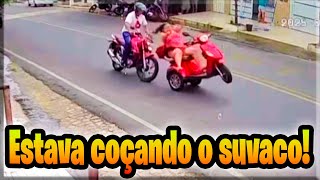 How does she stop in the middle of the street for that? She's going to blame the person who hits ...