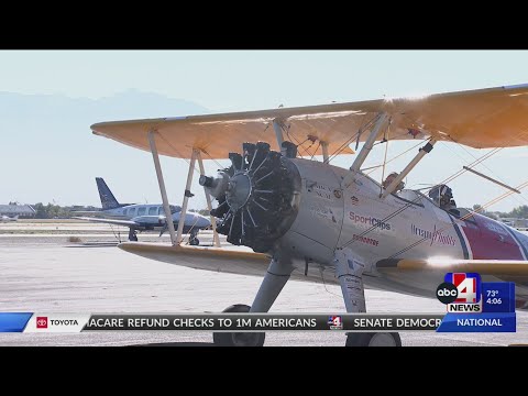 Utah veterans soar Salt Lake skies in a restored, open-cockpit ...