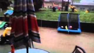 Son watching his Sandbox floating away in flood!