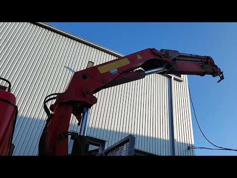 Scania P 93HL with a crane.