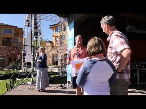 No Barriers Board Member Bill Barkeley gives a present to the recipients of the No Barriers Boston Fund.<br />
