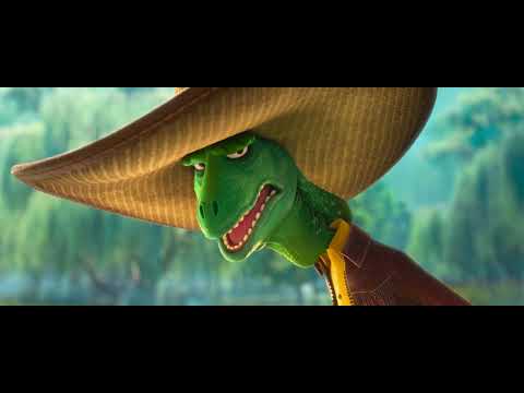 Trailer frame with bustling Zootopia streets lit by neon, hinting at dance-pop energy
