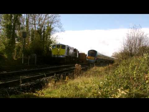 Irish Rail Class 22000 ICR passes a Class 071 on a Timber Liner