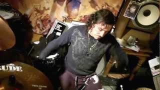 Cage playing Bloodsteel in their rehearsal room at Norms.