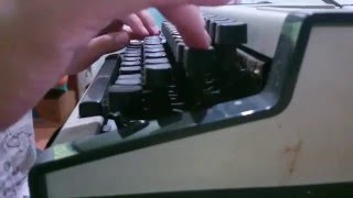 Typing on a Olympia Traveller De Luxe